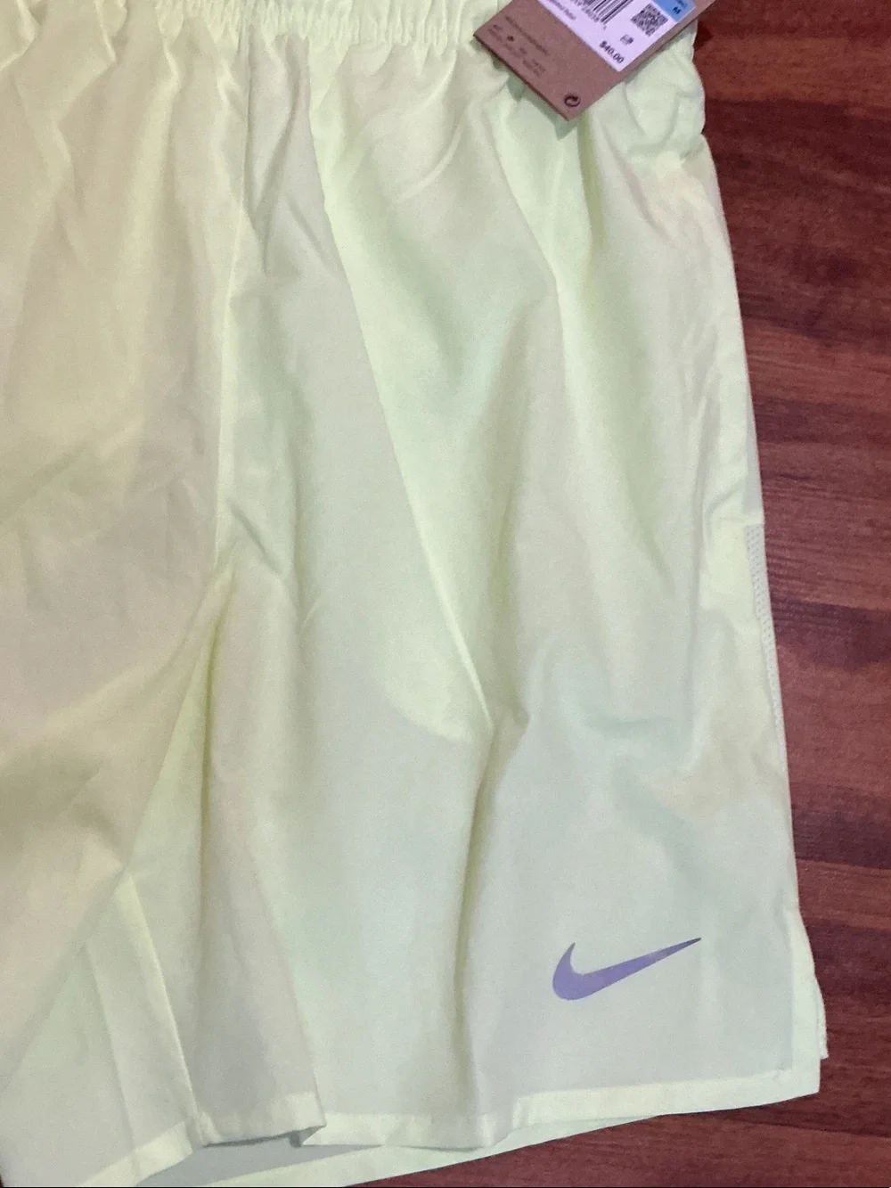 Nike men’s Pale Yellow Running Shorts with Reflective Swoosh nwt logo pockets